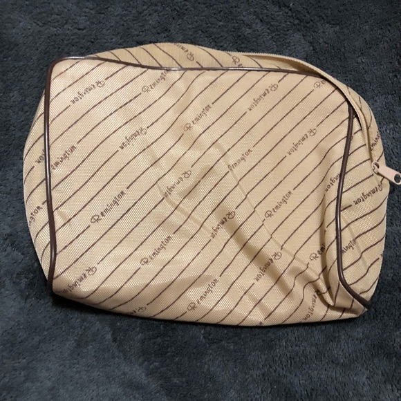 Remington Handbags - Remington • Cream Makeup Bag •Clutch